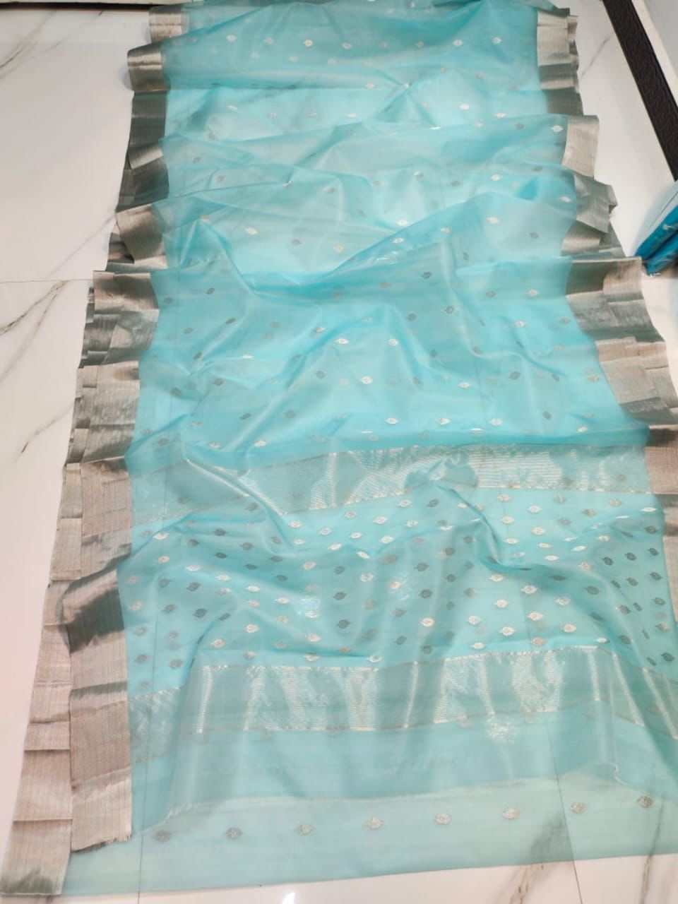 Ethereal Sky Blue with Elegant Silver Zari Buttas and Sleek Border Organza Chanderi Katan Silk Saree - Handloom Chanderi Saree