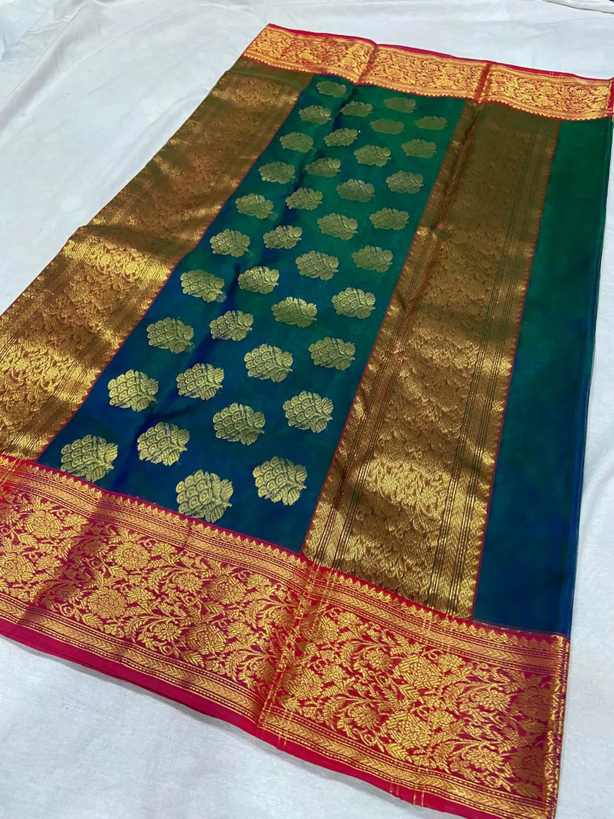 Handwoven Emerald Teal with Antique Gold Zari and Rani Pink Accents Emerald Teal with Opulent Gold Zari Floral Buti Kataan Silk - Authentic Chanderi Silk Saree Chanderi Saree