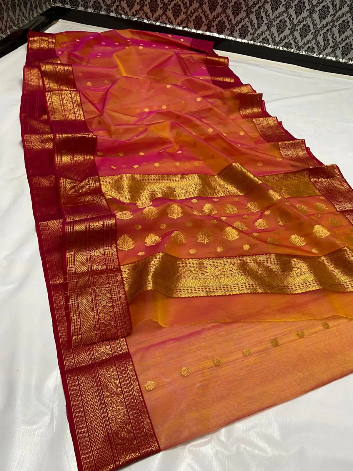Handwoven Fuchsia-Kissed Peach Ombre with Ruby Red Border and Antique Gold Zari Fuchsia-Kissed Peach Ombre Chanderi Saree with Ruby Red Border & Antique Gold Zari - Authentic Chanderi Silk Saree Chanderi Saree
