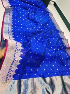 Majestic Cobalt with Silver Zari Bootis and Floral Border Pattu Silk